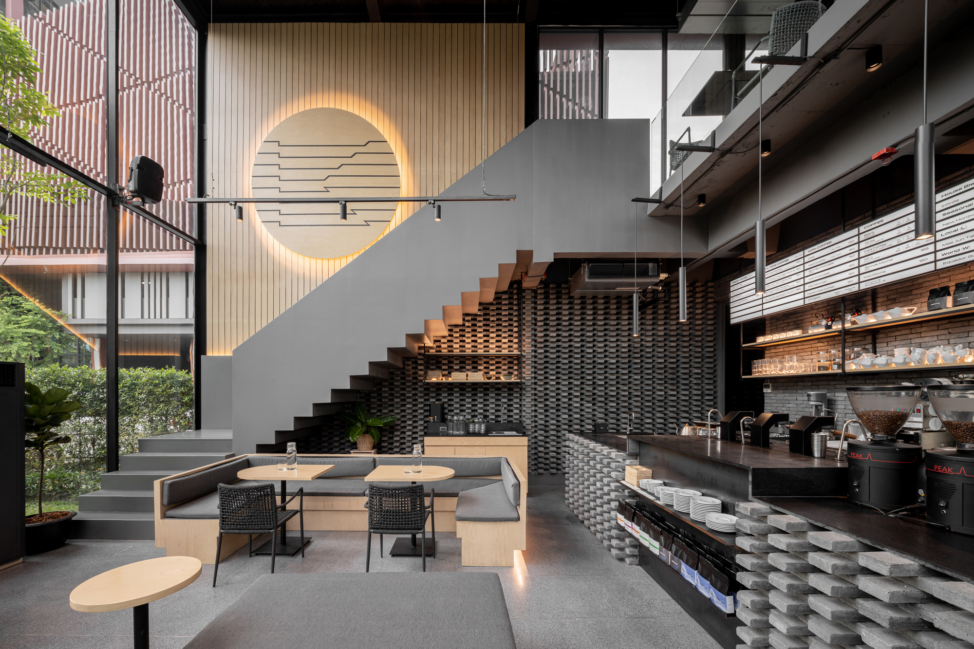Kaizen Coffee Ekkamai Bangkok, two-story glass-enclosed specialty coffee shop with natural light